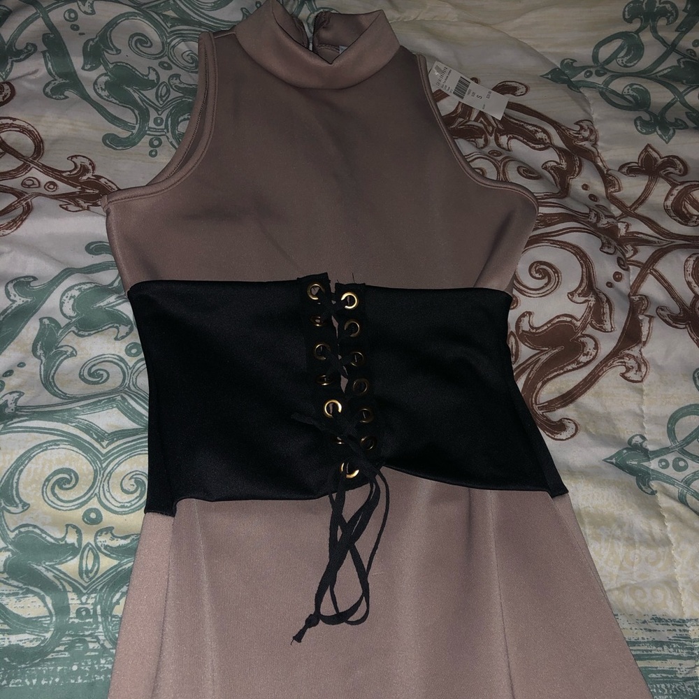 Fashion nova catsuit with black corset.